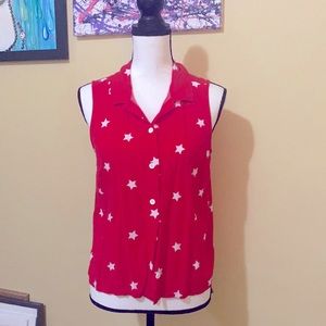 Red button up blouse.